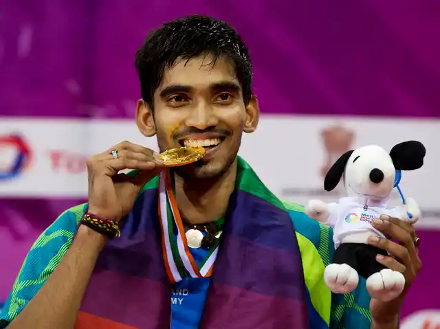Kidambi Srikanth displays his gold medal after winning the men’s singles final of Yonex Sunrise India Open Badminton in New Delhi, on 29 March 2015.