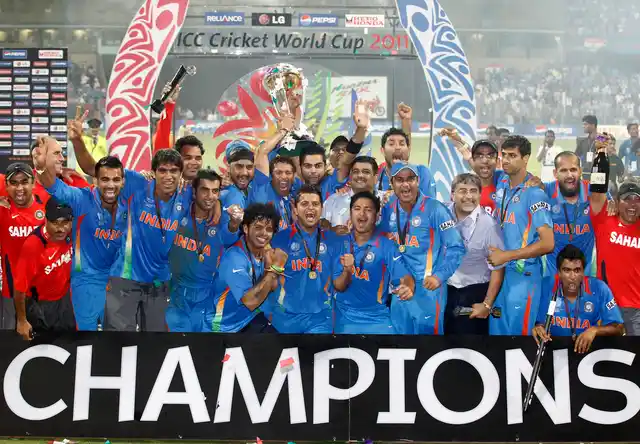 Ashish Nehra with the Indian 2011 World Cup winning team following the win over Sri Lanka in the final in Mumbai.