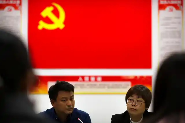 Participants attend a meeting of a residential community during a media tour highlighting the Communist Party’s efforts at the grassroots level in Beijing. <i>(Photo: AP)</i>