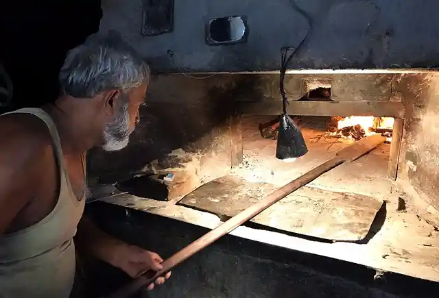 Mohammed Ali Hussain gets the fire burning.