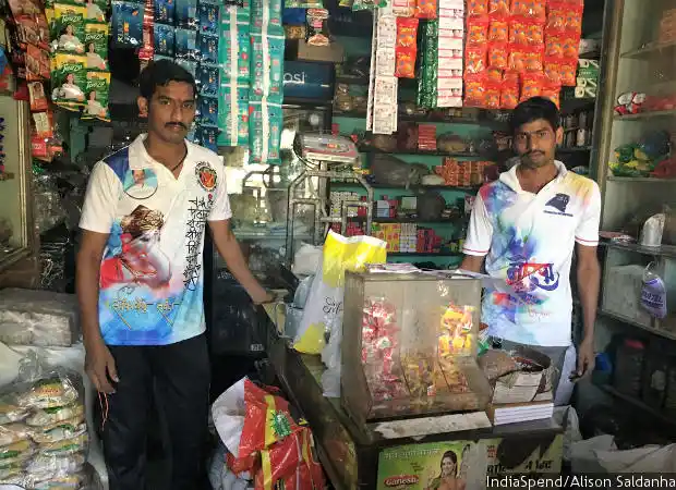 Nilesh Patil (right) runs Sadguru Krupa Stores in Kawad, currently in losses of over 50%. His joint family of nine members depend entirely on the shop’s income.