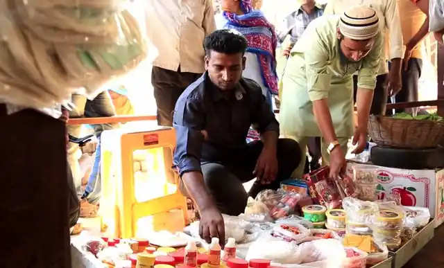 Ahmed Tamboli wraps up his spread after spotting a BMC official.