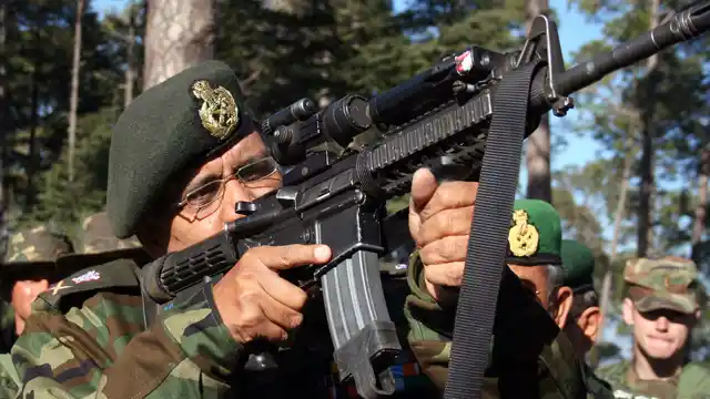 An Indian army officer inspects a US rifle during Indo-US joint exercise in Chaubattia, in the northern Indian state of Uttaranchal, on 26 January 2006. Image used for representational purposes.