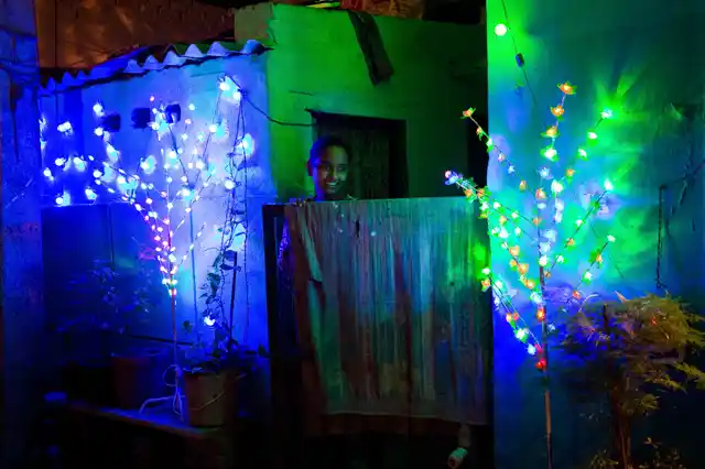 A house decorated with lights during Diwali in Chandrawal basti.