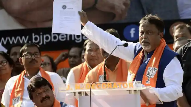 Mukul Roy addresses a BJP rally in Kolkata.
