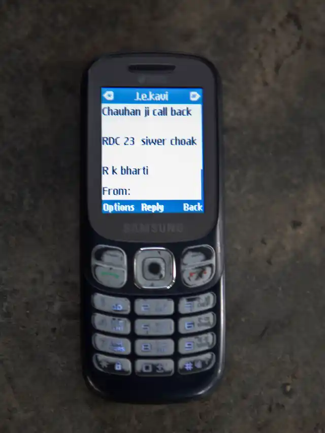 Supervisor Ratender Chauhan is informed via text message about the drains that need to cleaned/unblocked.
