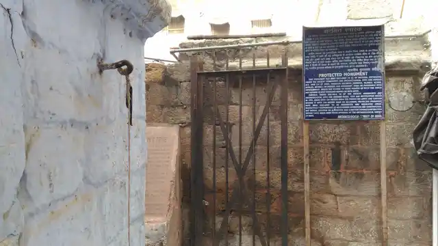 An ASI board that reads, ironically, ‘protected monument’.
