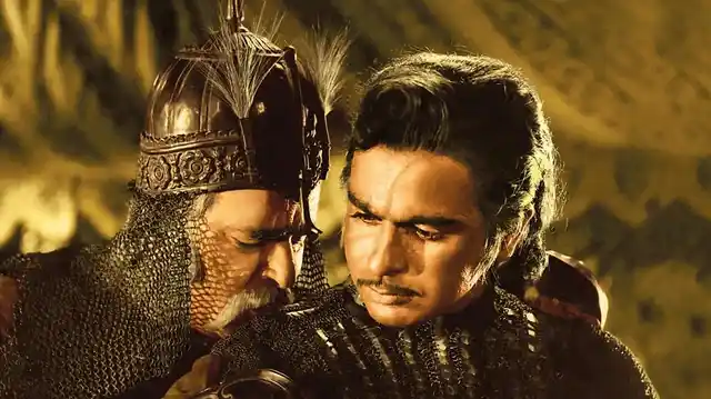 Dilip Kumar with Prithviraj Kapoor in <i>Mughal-e-Azam</i>.