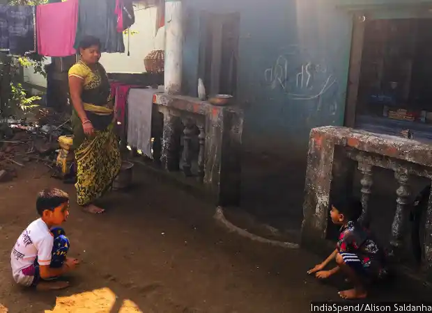 Lalita Patil and her sons Harshad and Tanish outside their home and the attached shop. Patil had reopened the store two years ago after her husband passed away in 2012. Her family of three is entirely dependent on the shop’s earnings.