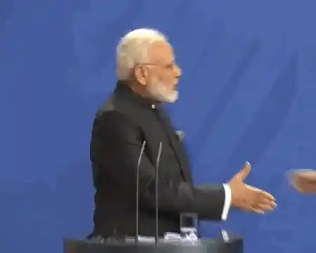 At least Modi and Merkel did shake hands shortly after.