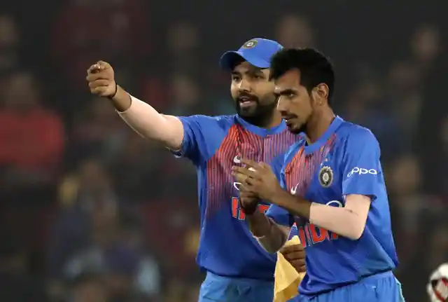 Rohit Sharma has a quick chat with Yuzvendra Chahal during Sri Lanka’s innings in Cuttack.