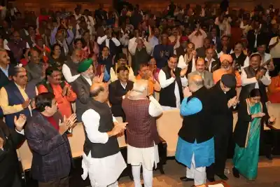 New Delhi: BJP president Amit Shah, Prime Minister Narendra Modi greets other leaders during the BJP Parliamentary Party meeting at Parliament House in New Delhi on Dec. 20, 2017. (Photo: Amlan Paliwal/IANS)