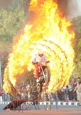 Daredevil Motorcyclist performs stunts for the audience at the Military Literature Festival.