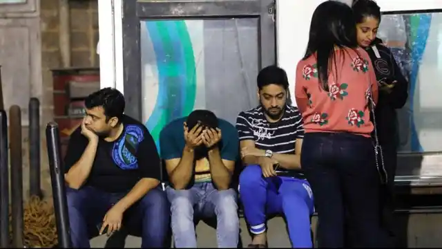 Kamala Mill fire tragedy victims’ friends wait outside a hospital.