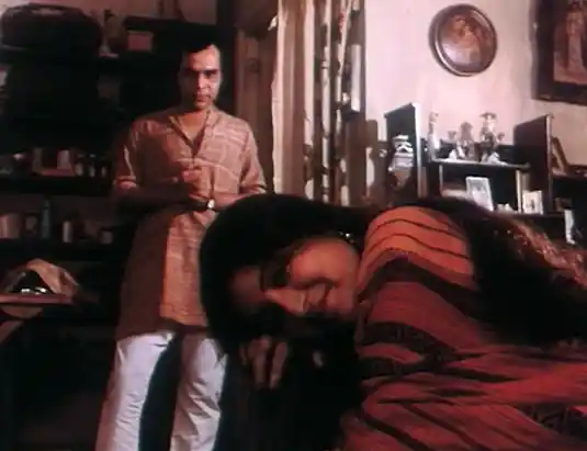 Dhritiman Chatterjee and Debashree Ray in <i>36 Chowringhee Lane.</i>