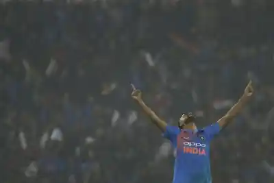 Cuttack: Jaydev Unadkat of India celebrates fall of Niroshan Dickwella