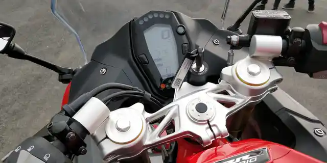 Vertical-shaped instrument cluster on the bike. 