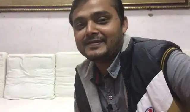 Muazzam Ansari, the man behind the red Banarasi saree that Anushka Sharma wore for her wedding reception in New Delhi.