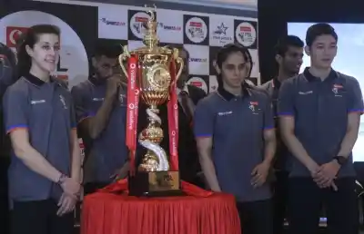 New Delhi: Badmonton players Saina Nehwal, Carolina Marin and other dignitaries during a programme organised to unveil Premier Badminton League (PBL) Trophy in New Delhi on Dec 20, 2017. (Photo: IANS)