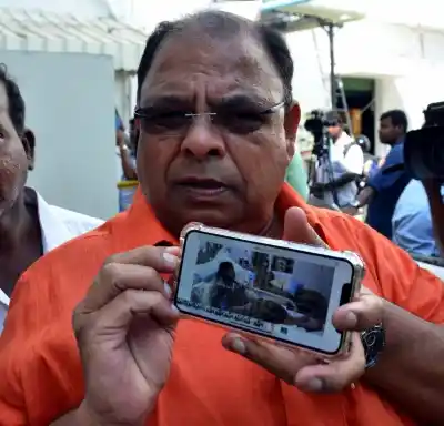 Chennai: Disqualified MLA P. Vetrivel shows a video clip of the late J. Jayalalithaa purportedly on her hospital bed, in Chennai on Dec 20, 2017. A day ahead of a critical by-election here in Chennai, sidelined AIADMK leader T.T.V. Dinakaran