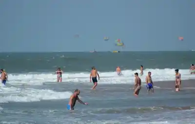 Tourists enjoy themselves at a Goa beach on Dec 7, 2017. (Photo: IANS)