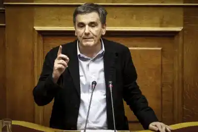 ATHENS, Dec. 20, 2017 (Xinhua) -- Greek Finance Minister Euclid Tsakalotos addresses lawmakers during the parliament