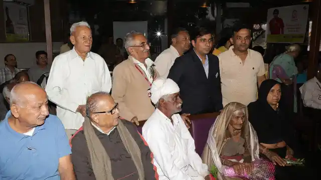 Ajiben (Seating second from right) with other senior citizens during the event on Monday