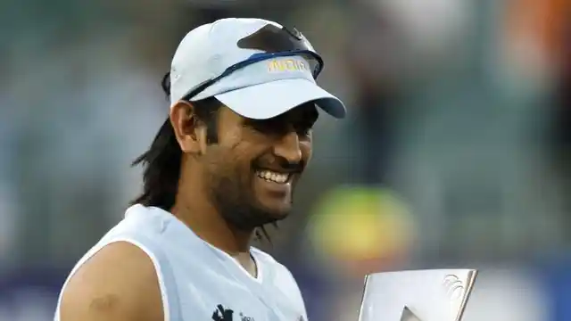 MS Dhoni poses with the World T20 trophy in 2007.