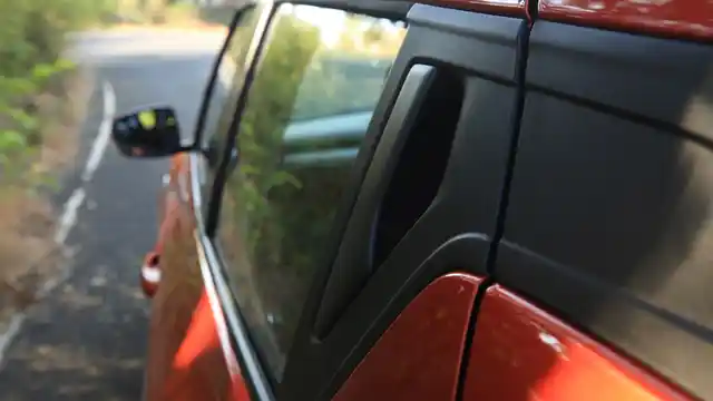 The rear door handle is on the C-pillar, like the Chevrolet Beat and Mahindra KUV100. 