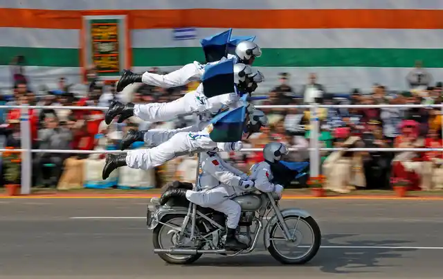 Indian Army “Daredevils” motorcycle riders perform during the Republic Day parade in Kolkata, India, 26 January 2018.