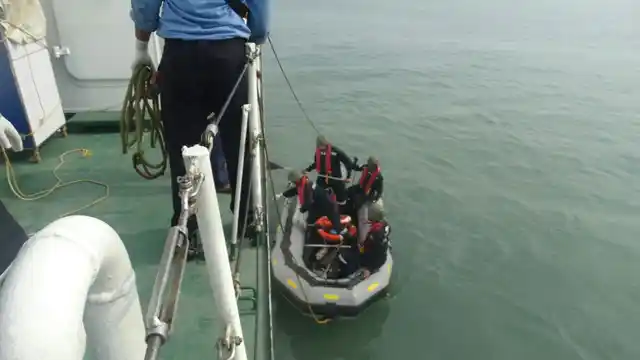 Search and rescue operations being conducted at the spot where the chopper’s debris was found.