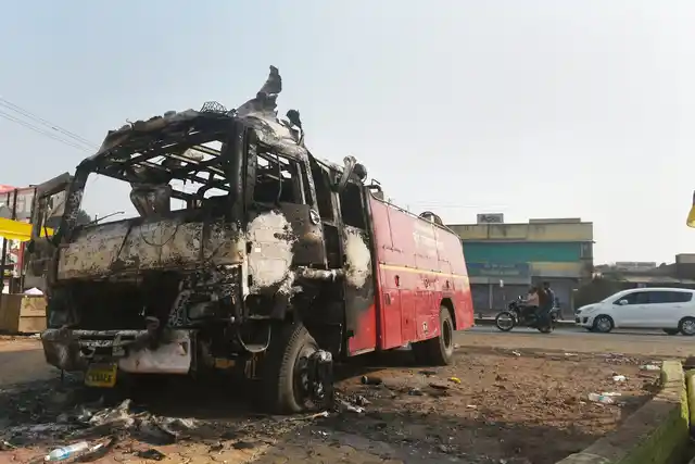 Charred remains of a firefighting vehicle following the violence during celebrations of 200th anniversary of the Battle of Bhima Koregaon, near Pune on Tuesday. 