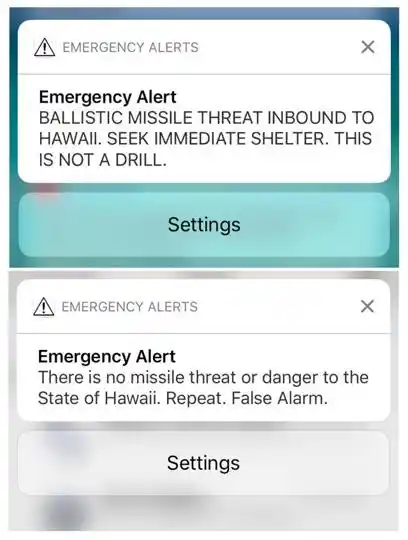 A combination photograph shows screenshots from a cell phone displaying an alert for a ballistic missile launch and the subsequent false alarm message in Hawaii. 