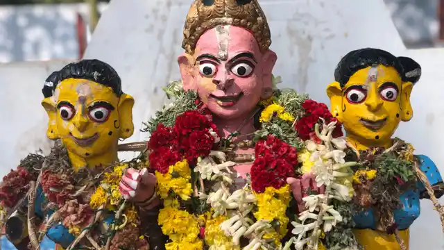 ‘Muruga’ flanked by ‘Valli and Devanai’.