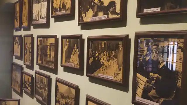 A wall of portraits at Netaji Bhawan.