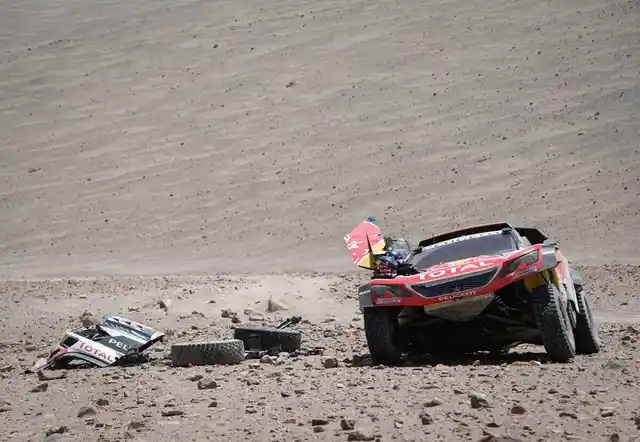 A broken down Peugeot off-roader.