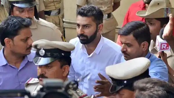 Youth Congress General Secretary Mohammed Haris Nalapad being taken away by police for allegedly assaulting a person in Bengaluru on Monday. 