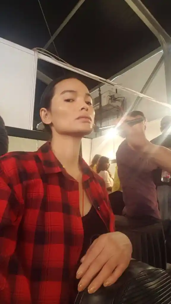Anjali gets her makeup in place before the show starts.
