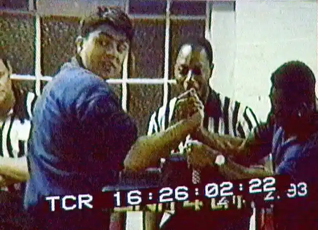 A 1993 video grab of Omar in a hand-wrestling bout, a sport he excelled in. 