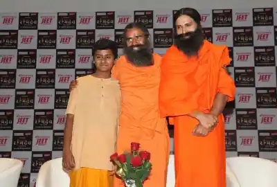New Delhi: Yoga Guru Baba Ramdev with actor Kranti Prakash Jha and child artiste Naman Jain during a press conference on the launch of a biopic series