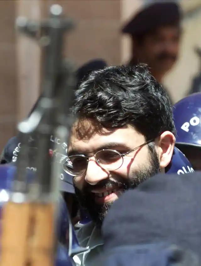 Omar on his way to a trial hearing. 