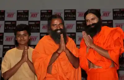 New Delhi: Yoga Guru Baba Ramdev with actor Kranti Prakash Jha and child artiste Naman Jain during a press conference on the launch of a biopic series