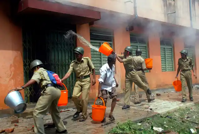15 March 2007: Police douse flames in Nandigram. 