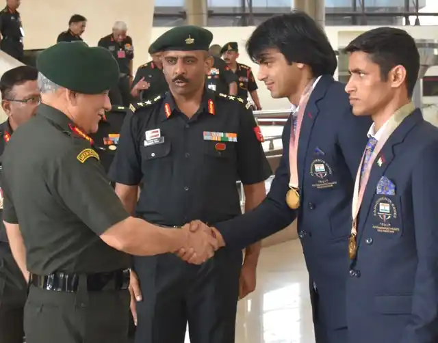 Army Chief General Bipin Rawat congratulates Naib Subedar Neeraj Chopra, Gold Medallist (Javelin Throw) and Havildar Gaurav Solanki, Gold medallist (Boxing) for their outstanding performance in the recently concluded Commonwealth Games (CWG) 2018; in New Delhi on 18 April 2018.