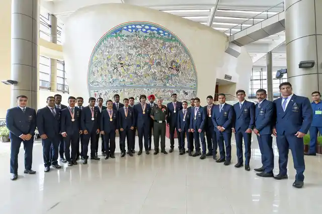 Army chief Bipin Rawat poses with Army’s sportsmen who won medals in the Commonwealth Games 2018, at Manekshaw Centre in New Delhi on 18 April.