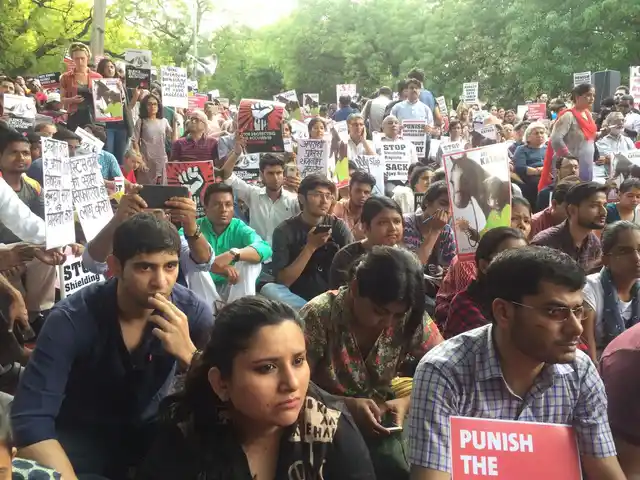 A large crowd gathered to demand justice.
