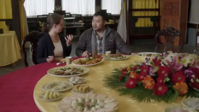 Dave Chang dines at a resturant in China in Netflix’s <i>Ugly Delicious. </i>