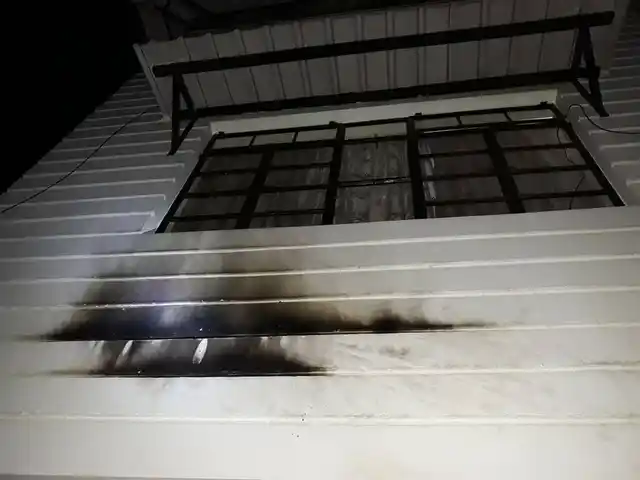 The journalist’s wall after being hit by the petrol bomb.