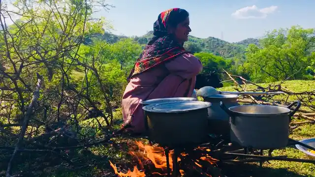 The victim’s birth mother, Rasiya, trying to get life back on track as they hurry away from the spot where their lives were devastated.