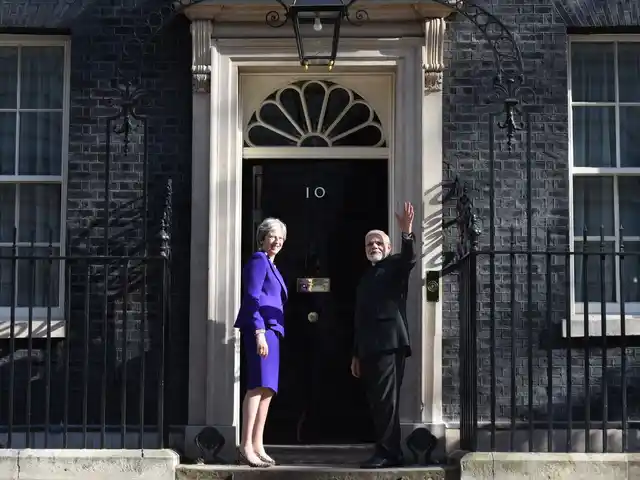 PM Modi meets UK PM Theresa May in London.